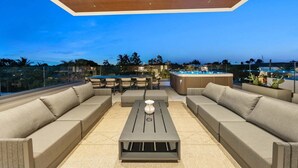 A rooftop terrace with a pool, outdoor seating, and a hot tub. - Villa Ocean by Rove Travel Coastal Luxury Villa (Fort Lauderdale)