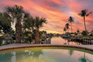 A heated pool - Canal-Front Sunset Oasis + Pool + Boat Dock Marco Island (Marco Island)