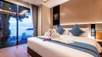 Premier Suite, Balcony, Sea View | Down duvets, in-room safe, desk, laptop workspace