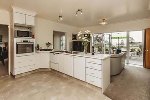 Fridge, microwave, oven, dishwasher - Waterfront Apartment in Fitzroy (New Plymouth)