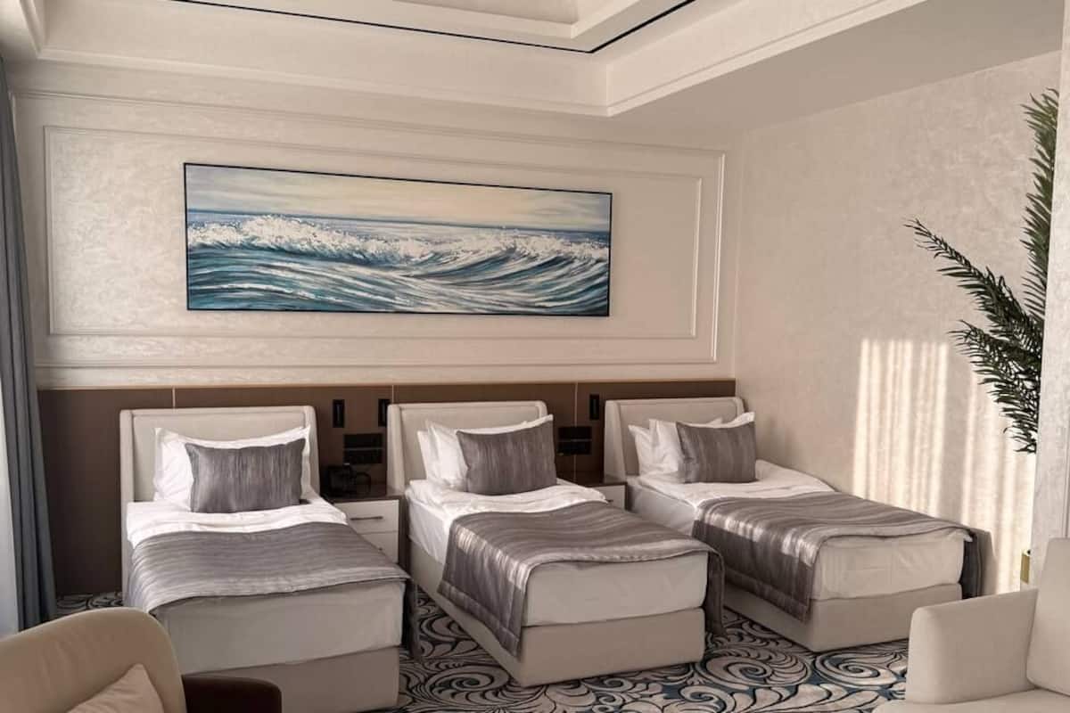 Standard Triple Room, Balcony, City View | Premium bedding, in-room safe, desk, laptop workspace