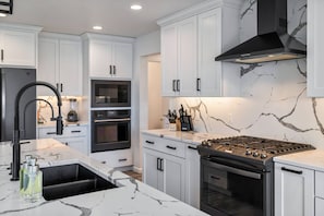 Coffee/tea maker, fridge, microwave, oven