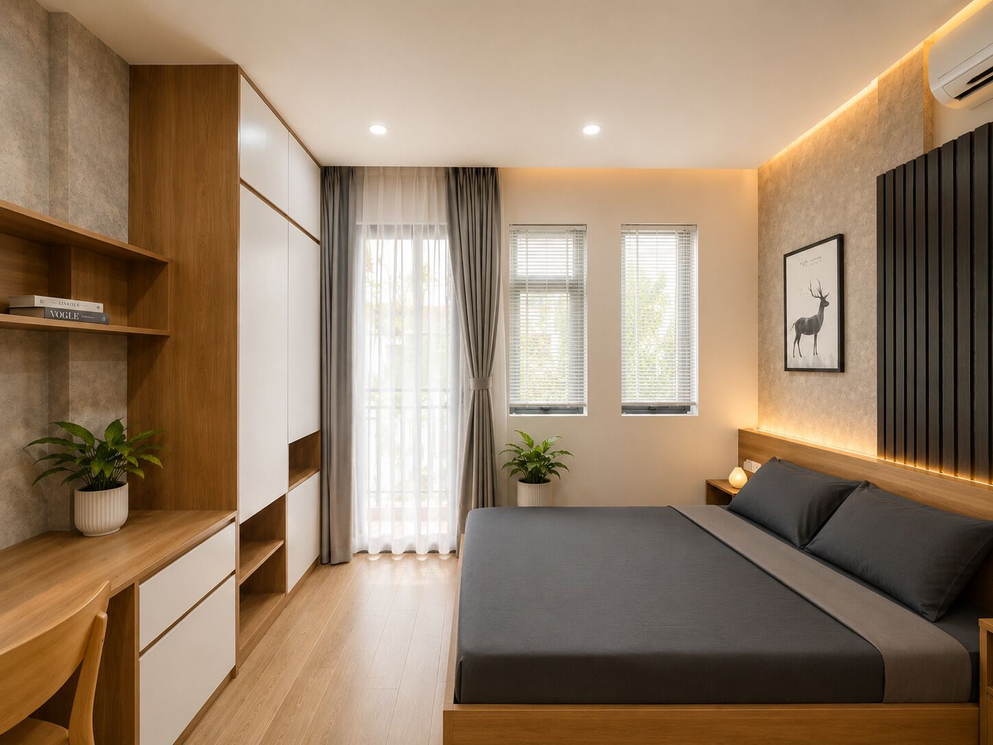 Ein modernes Schlafzimmer mit einem Bett, Nachttischen, einem Schreibtisch und einem Bücherregal.