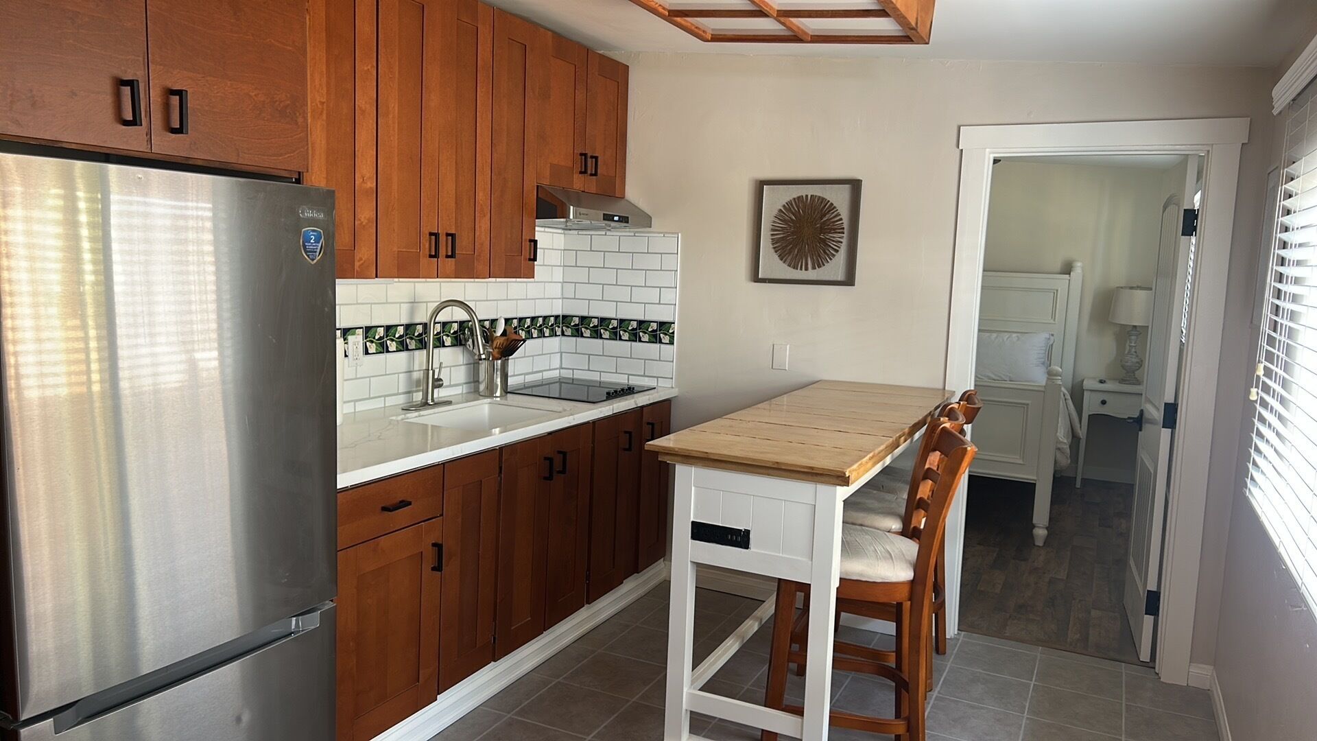 Fridge, microwave, stovetop, coffee/tea maker
