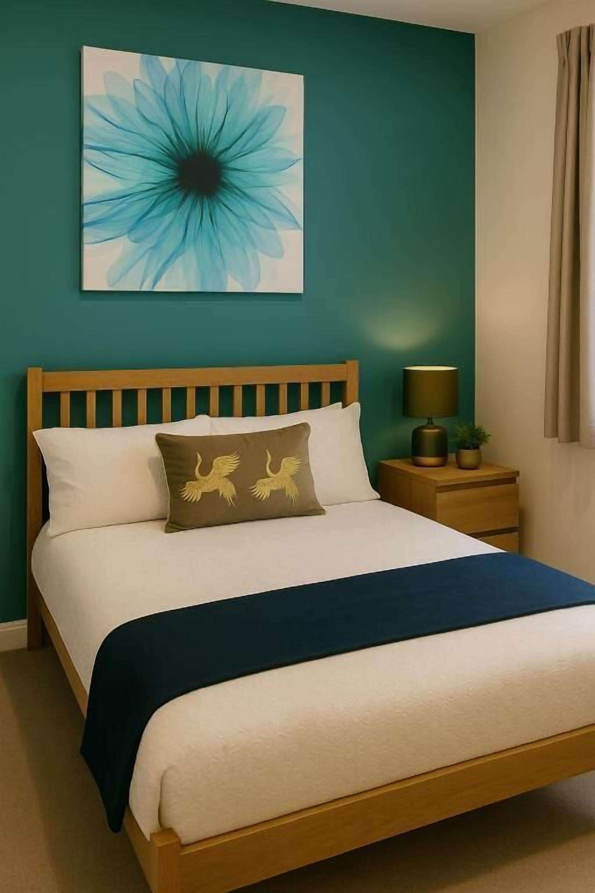 Tabla de planchar con plancha, wifi gratis, ropa de cama