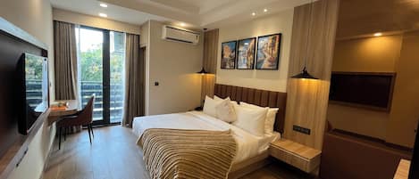 Family Double Room, City View | In-room safe, desk, laptop workspace, blackout drapes