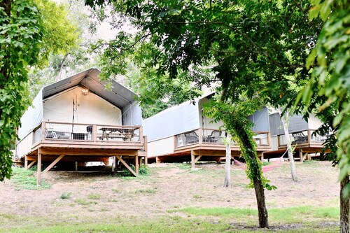 Luxury Tented Cabin Retreat - Fun Glamping Vacation by the Water for the Whole Family in Seguin, Texas