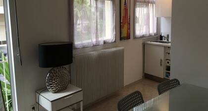 On the seafront, comfortable studio near Garavan station.