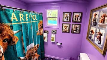 Jetted bath, hair dryer, towels, soap