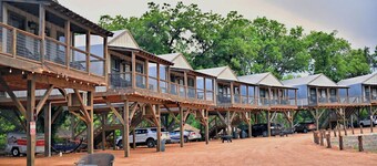 Family Escape by the Water: Fully Equipped Waterfront Tented Cabin Getaway in Cibolo, TX