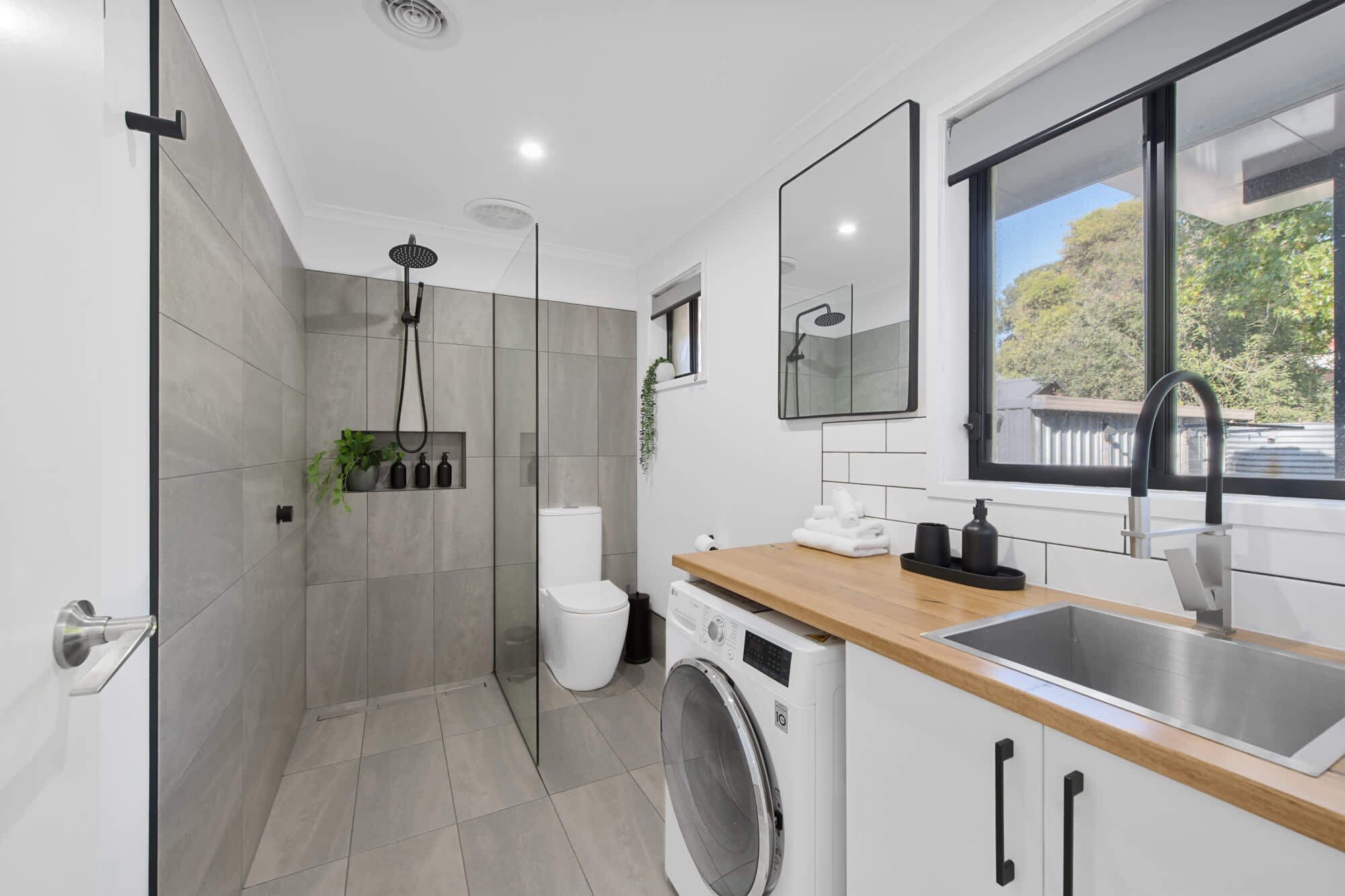 Shower, hair dryer, towels, shampoo