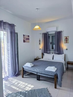 1 habitación, tabla de planchar con plancha, internet y ropa de cama 