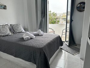1 dormitorio, tabla de planchar con plancha, Internet y ropa de cama