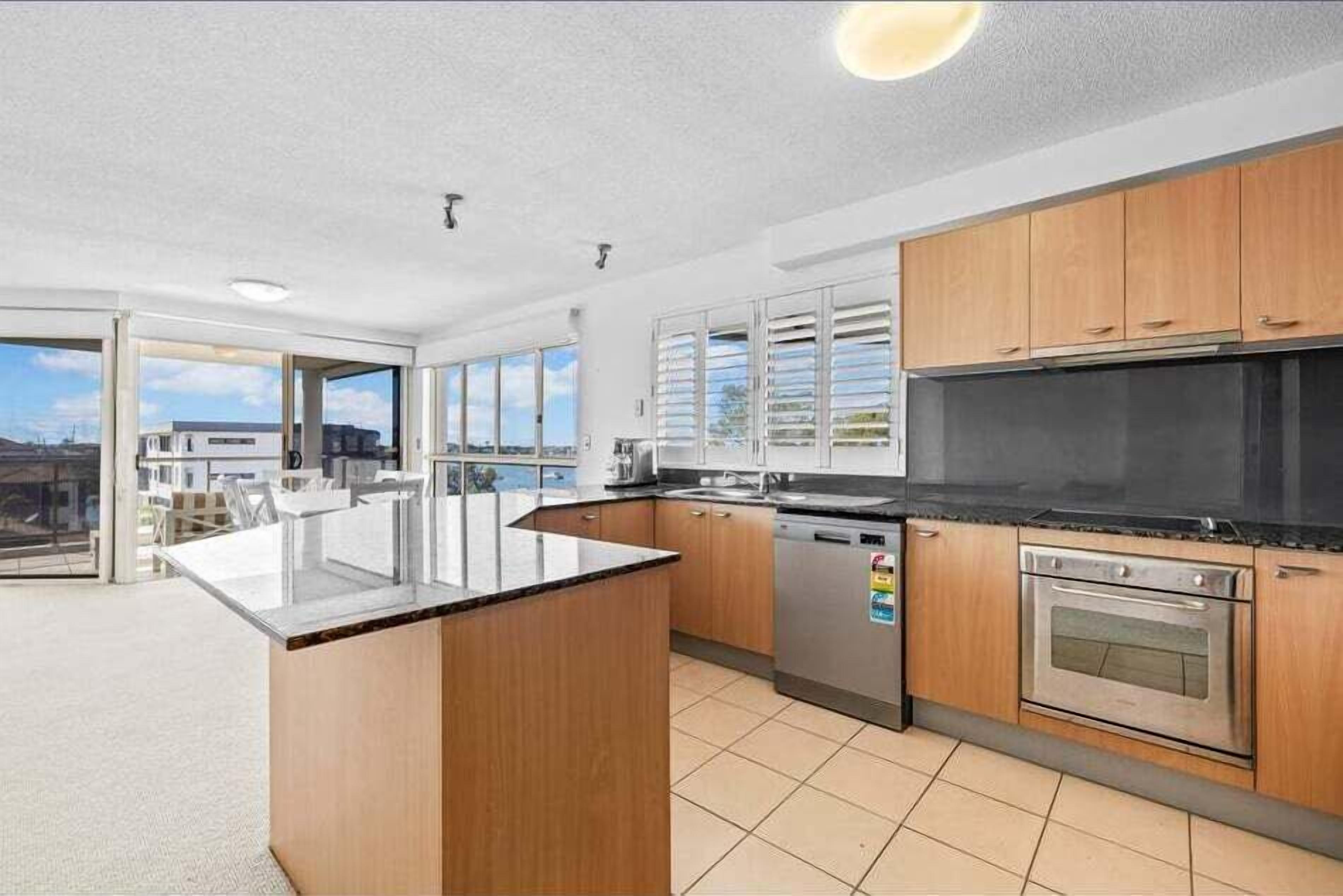 Fridge, stovetop, dishwasher, coffee/tea maker