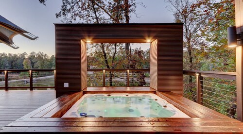 Hot Springs Getaway: Fully Equipped Tented Cabin with Nature's Embrace and Private Hot Tub