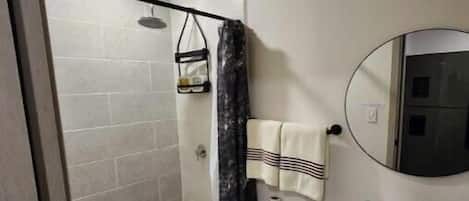 Shower, towels, soap, toilet paper