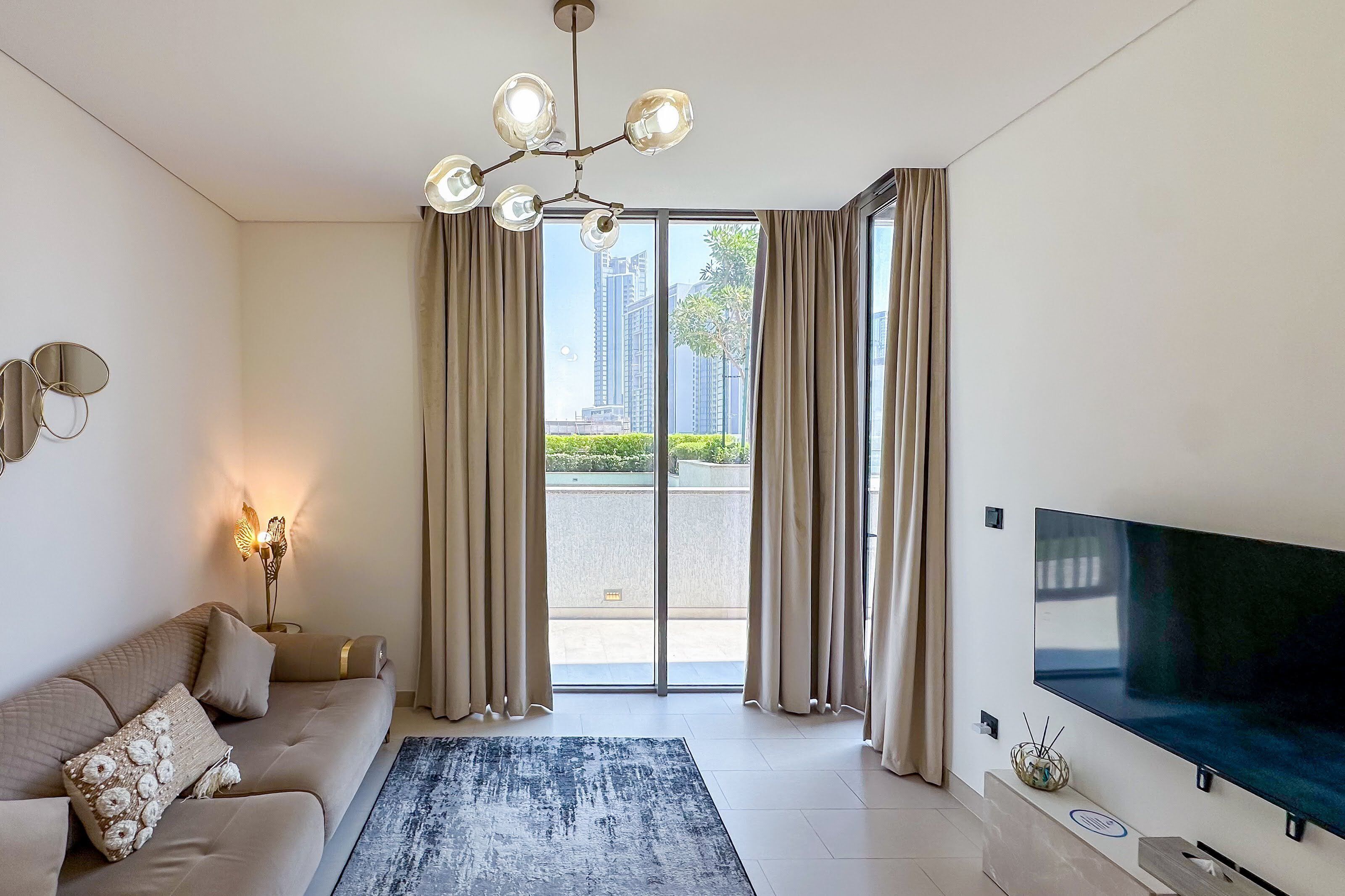 Standard Apartment | Living area | 42-inch Smart TV with satellite channels, Netflix, streaming services