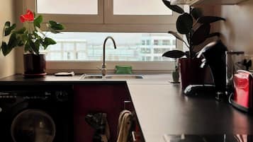 Fridge, microwave, stovetop, coffee/tea maker