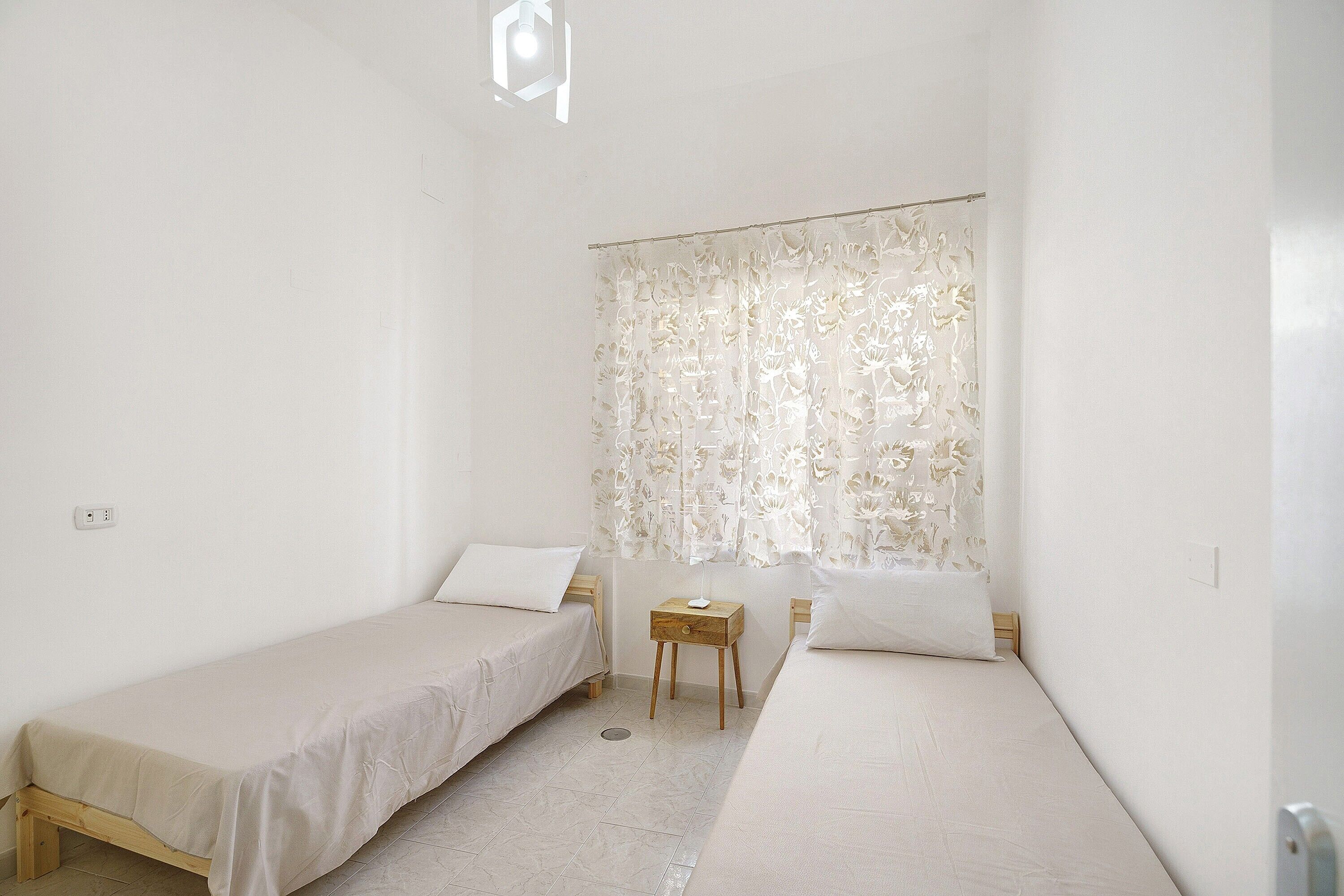 2 chambres, fer et planche à repasser, Wi-Fi, draps fournis