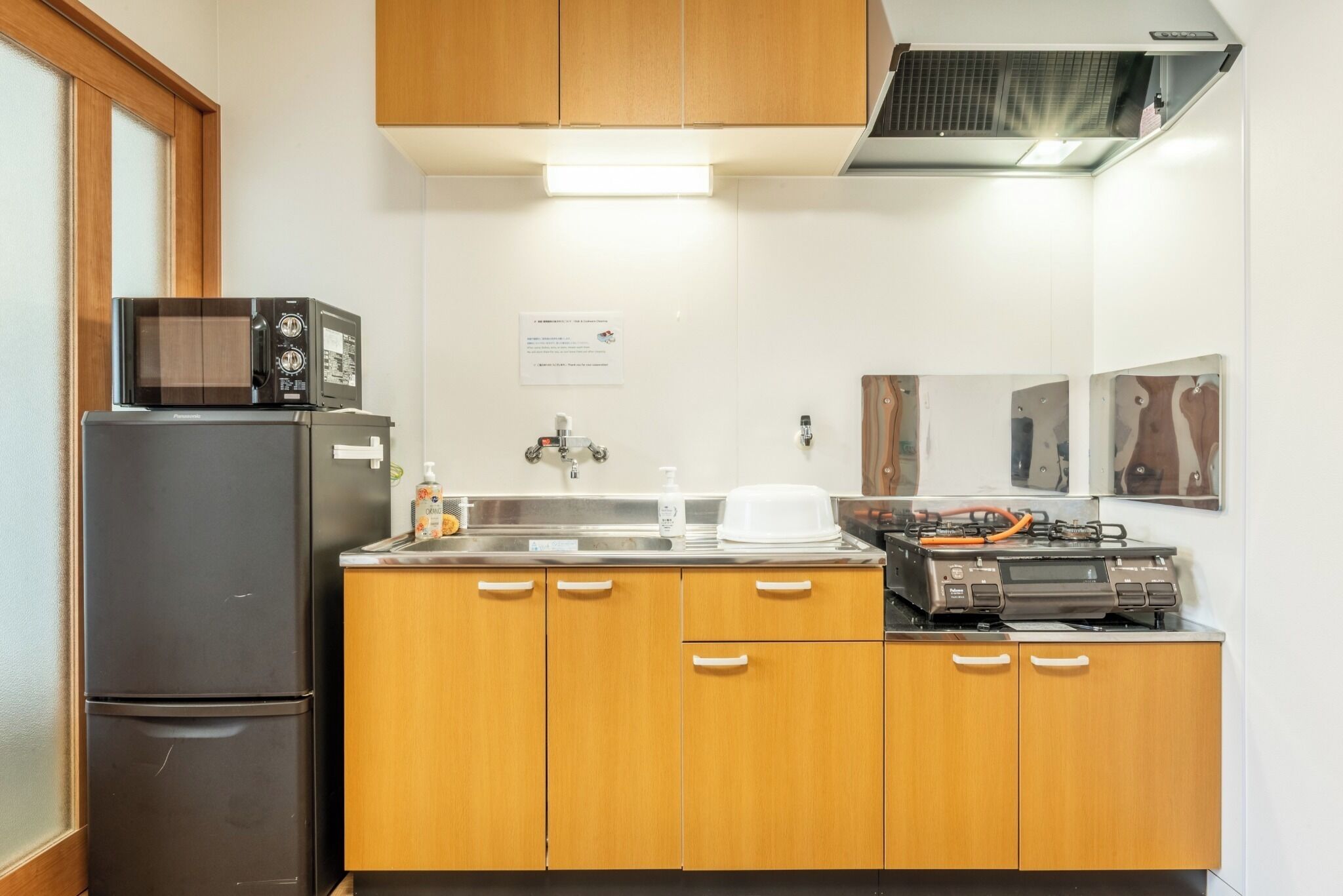 Fridge, microwave, stovetop, cookware/dishes/utensils