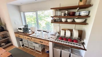 Fridge, microwave, cookware/dishes/utensils