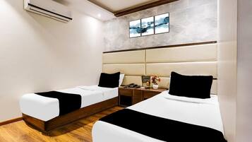 1 bedroom, desk, bed sheets