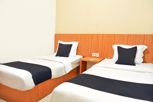 Escapade confortable à deux lits avec Wi-Fi et