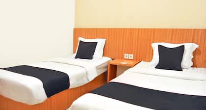 Escapade confortable Ă deux lits avec Wi-Fi et