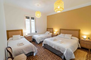 4 habitaciones, tabla de planchar con plancha, wifi y ropa de cama 