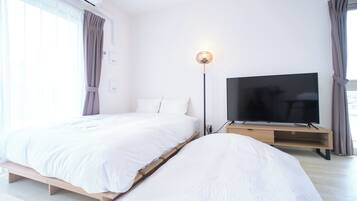 Blackout drapes, iron/ironing board, WiFi (free)