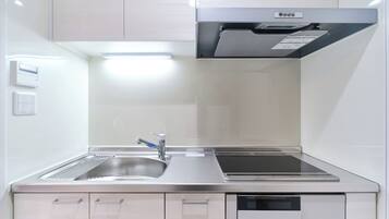 Apartment, Non Smoking (301,D) | Private kitchen | Mini-fridge, microwave, stovetop, electric kettle