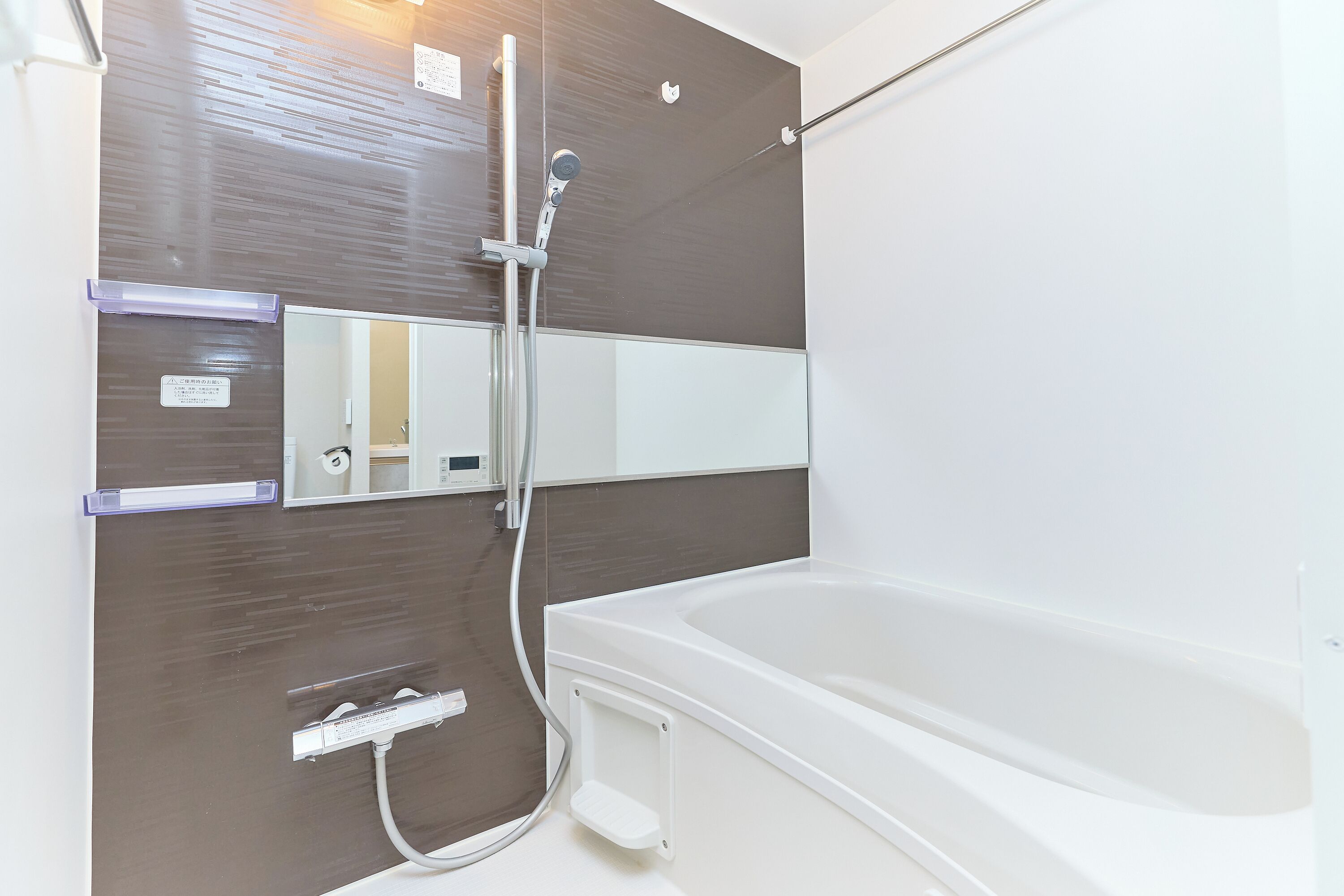 Combined shower/tub, free toiletries, hair dryer, slippers