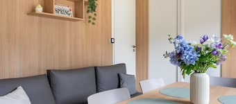 Comfortable caravan in a green setting