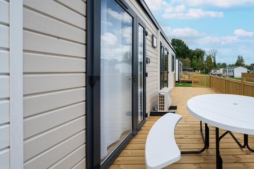 Comfortable caravan in a green setting