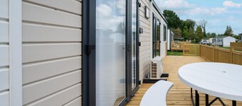 Comfortable caravan in a green setting