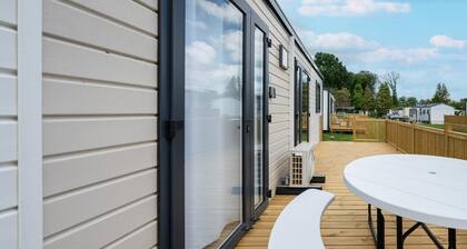 Comfortable caravan in a green setting