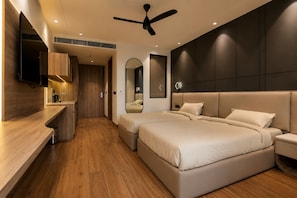 Habitación superior, 2 camas individuales | Escritorio, espacio para trabajar con laptop y cortinas blackout