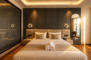 A modern bedroom with a large bed, bedside tables, a mirror, and a view of the outside. - Melange Hotel - Golf course road (Gurugram)