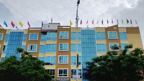 A multi-story building with a sign reading 'BINAYAK PALACE.' - Binayak Palace OD (Kendrapara)