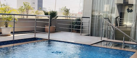 Business Apartment, 1 Bedroom, Pool Access, City View | Individually furnished, blackout drapes, free WiFi, bed sheets