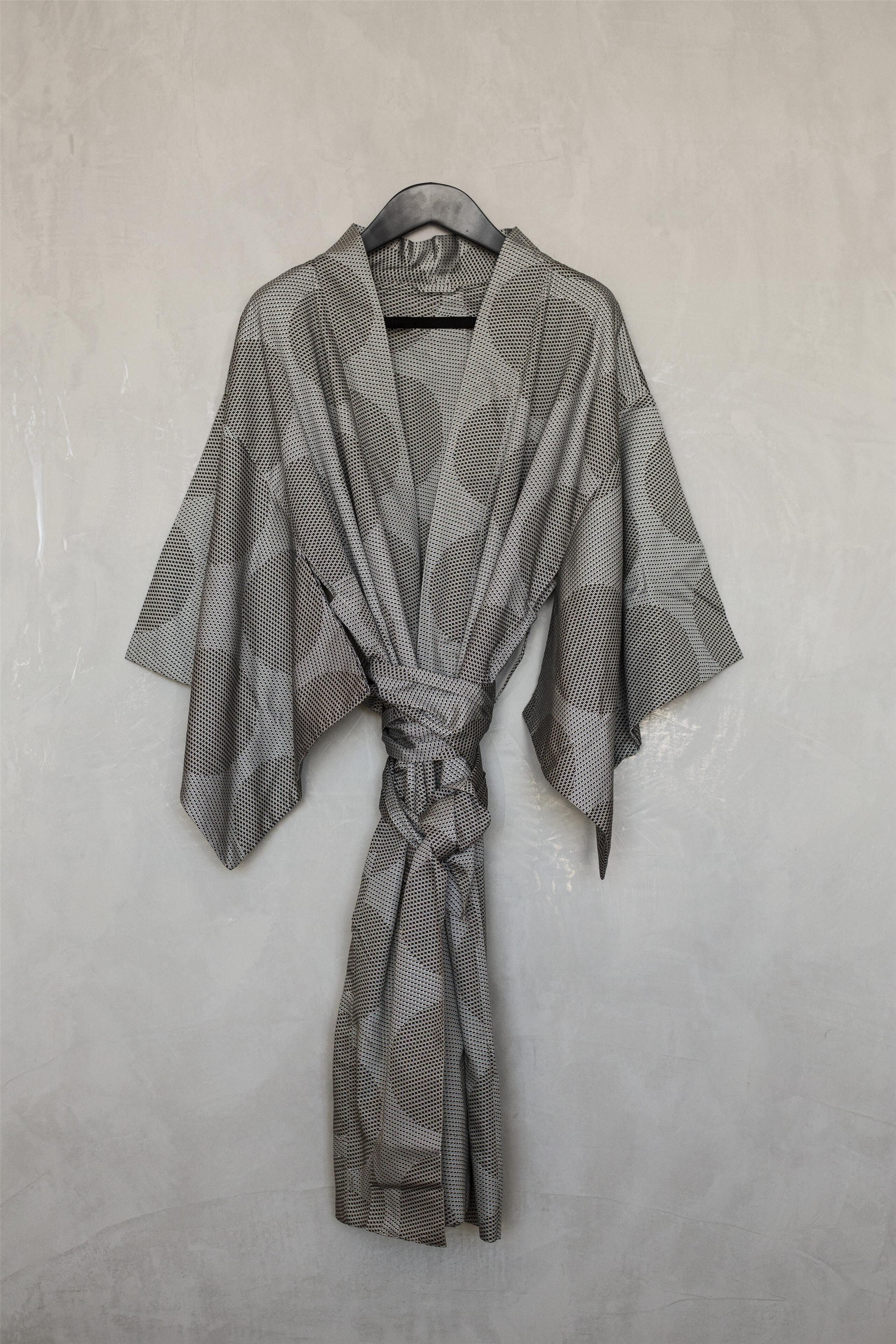 A patterned garment on a hanger.