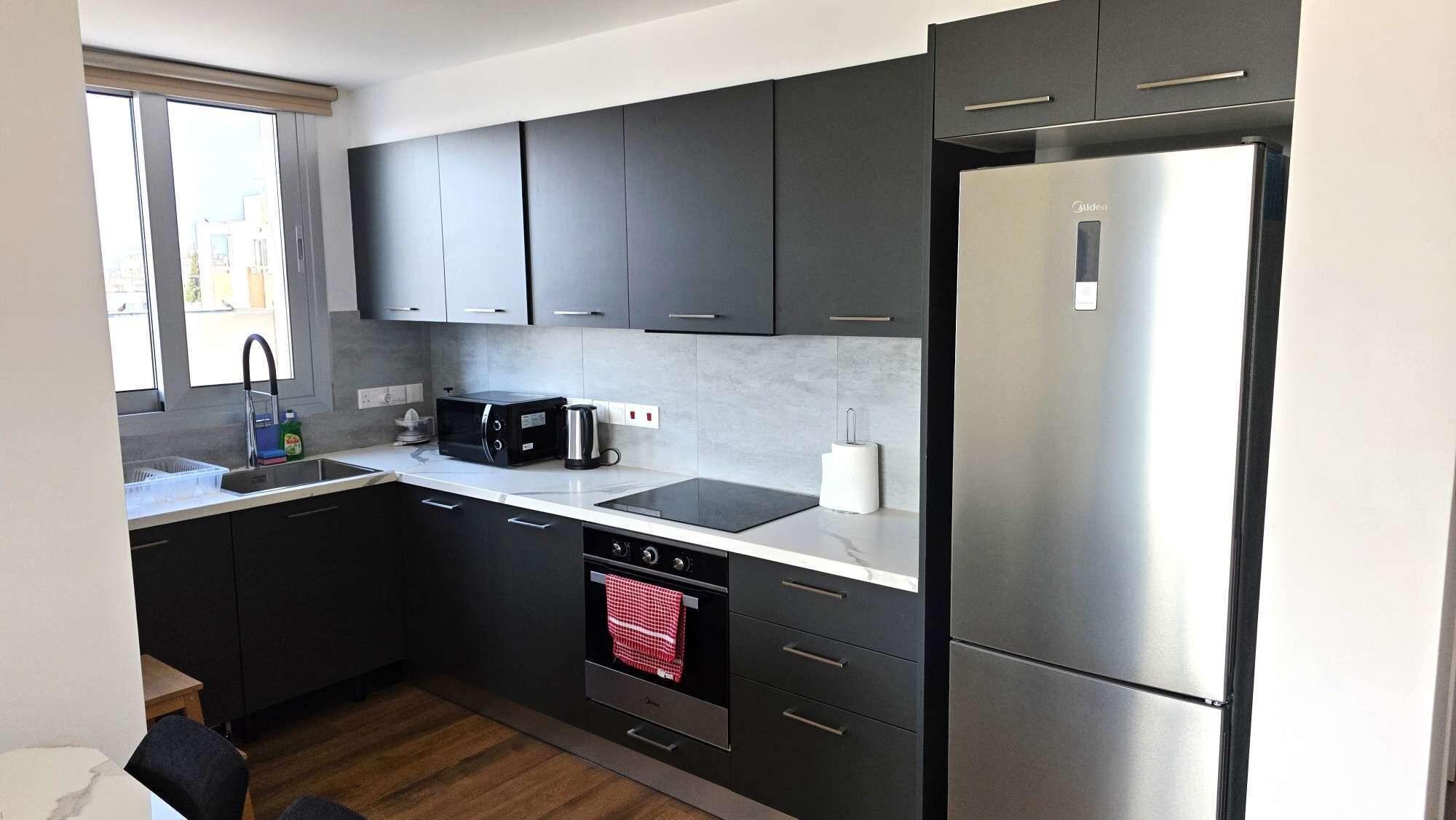 Fridge, microwave, stovetop, cookware/dishes/utensils