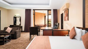 Suíte executiva, sacada, vista para a cidade