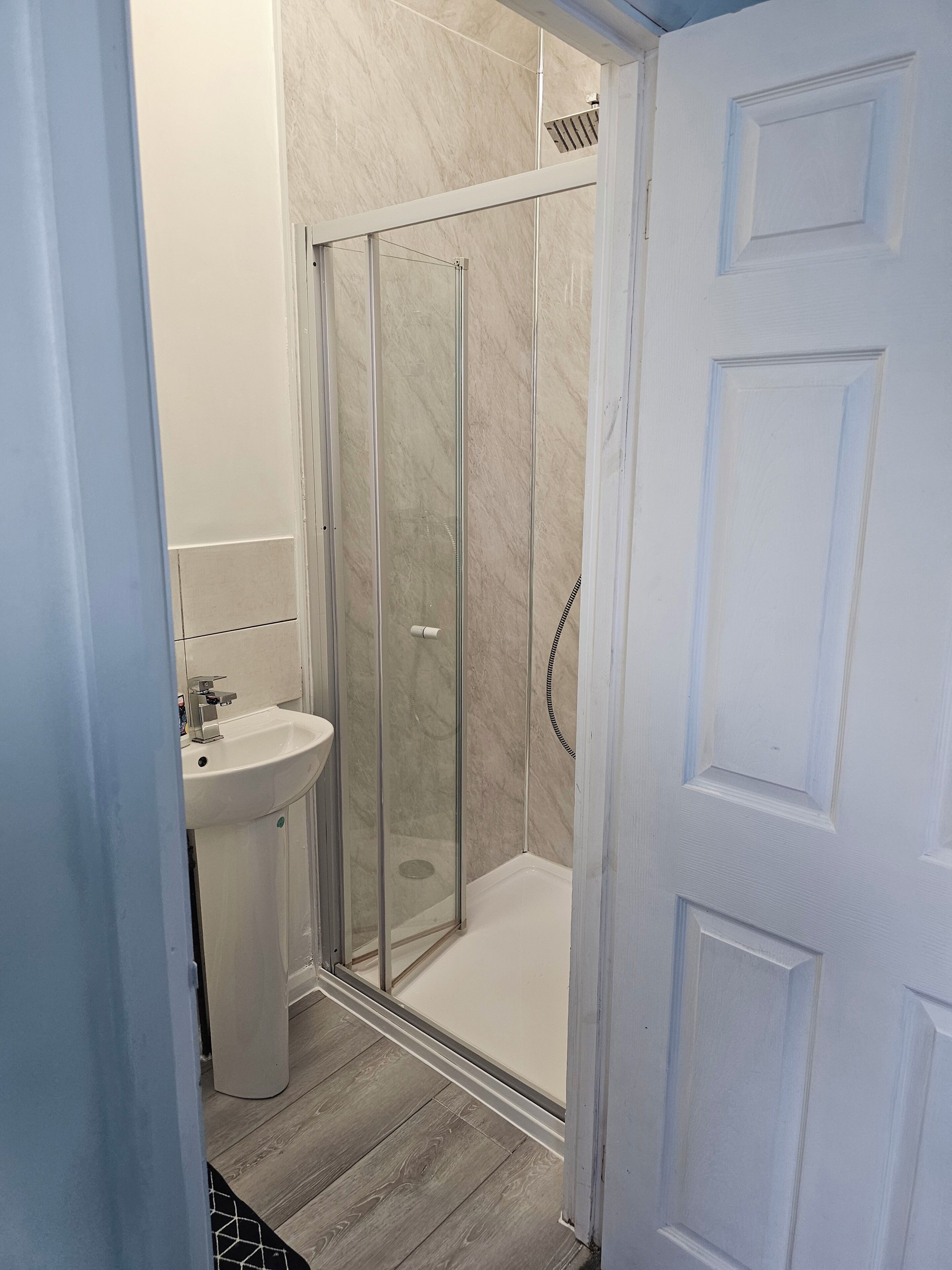 Shower, towels, toilet paper