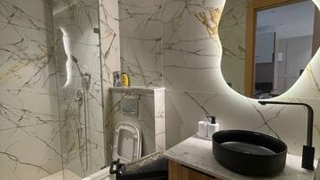 Hair dryer, towels, soap, toilet paper