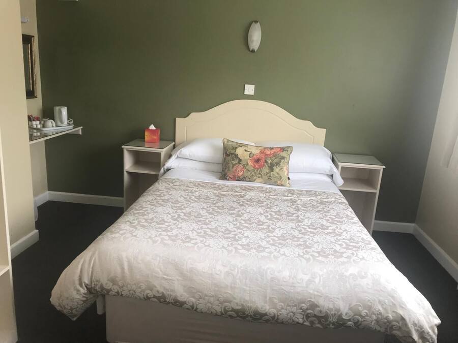 Standard Double Room, Garden View | Blackout drapes, iron/ironing board, free WiFi