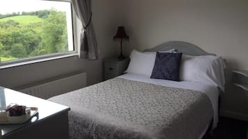 Standard Double Room, Garden View | Blackout drapes, iron/ironing board, free WiFi