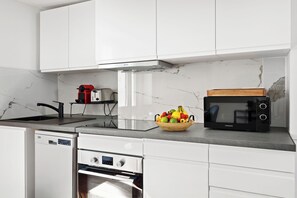 City-Apartment, Mehrere Betten, Nichtraucher, Blick auf den Innenhof | Eigene Küche | Espressomaschine, Wasserkocher mit Kaffee-/Teezubehör, Wasserkocher