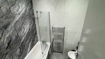 Hair dryer, towels, soap, toilet paper
