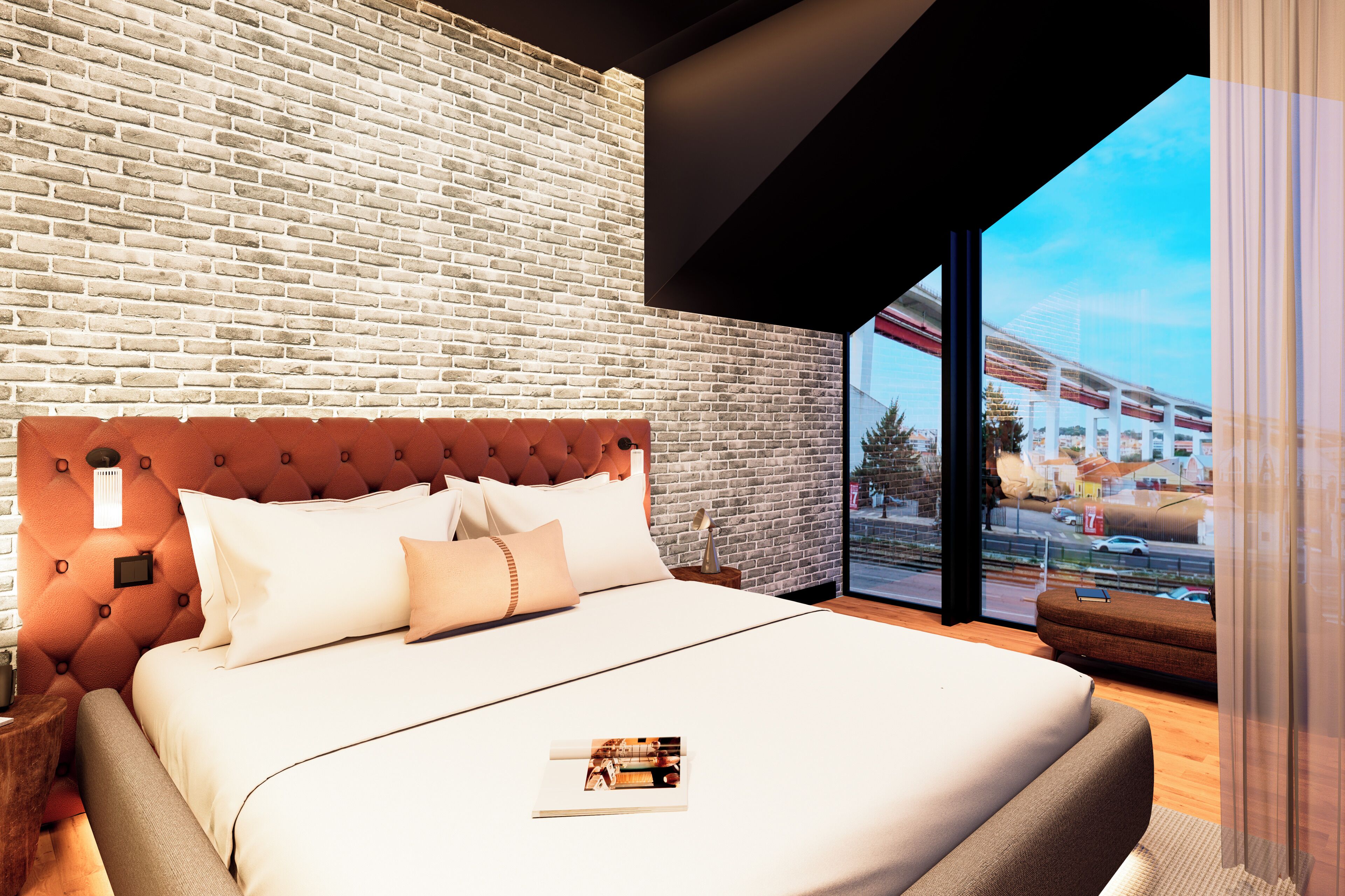 Un dormitorio moderno con pared de ladrillo, cabecera acolchada, ventana grande y vista a un tren.